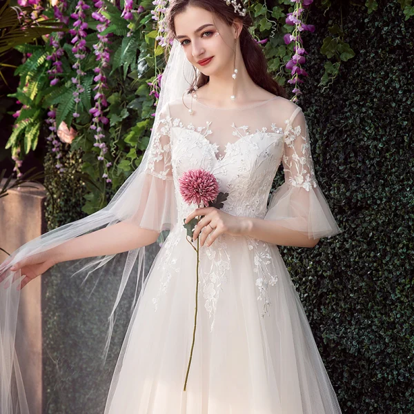 Affordable Champagne Outdoor / Garden See-through Wedding Dresses 2019 A-Line / Princess Scoop Neck Bell sleeves Backless Appliques Lace Sequins Sweep Train Ruffle