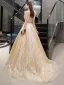 Illusion Doré Transparentes Robe De Soirée 2019 Princesse Col v profond Sans Manches Paillettes Perlage Glitter Tulle Train De Balayage Volants Dos Nu Robe De Ceremonie