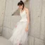 Chic / Belle Blanche Été de retour Robe De Graduation 2019 Princesse Bretelles Spaghetti Sans Manches Thé Longueur Volants Dos Nu Robe De Ceremonie
