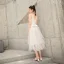 Chic / Belle Blanche Été de retour Robe De Graduation 2019 Princesse Bretelles Spaghetti Sans Manches Thé Longueur Volants Dos Nu Robe De Ceremonie
