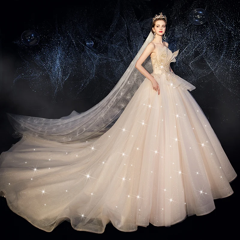 Beste Champagne Brudekjoler 2019 Ballkjole Fantastiske Unike Kjæreste Uten Ermer Ryggløse Glitter Tyll Beading Paljetter Chapel Train Buste