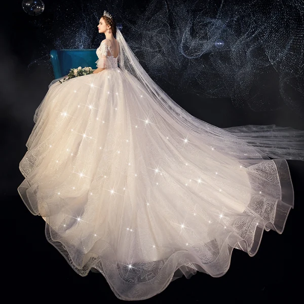 Chic / Belle Champagne Transparentes Robe De Mariée 2019 Princesse Encolure Dégagée Manches de cloche Dos Nu Glitter Tulle Appliques En Dentelle Perlage Perle Chapel Train Volants
