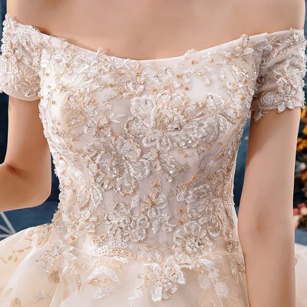 Stunning Champagne Wedding Dresses 2019 Ball Gown Off-The-Shoulder Short Sleeve Backless Appliques Lace Flower Beading Cathedral Train Ruffle
