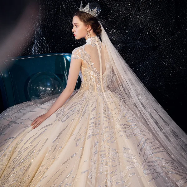 Sparkly Champagne See-through Wedding Dresses 2019 Ball Gown High Neck Cap Sleeves Backless Glitter Sequins Tulle Beading Royal Train Ruffle
