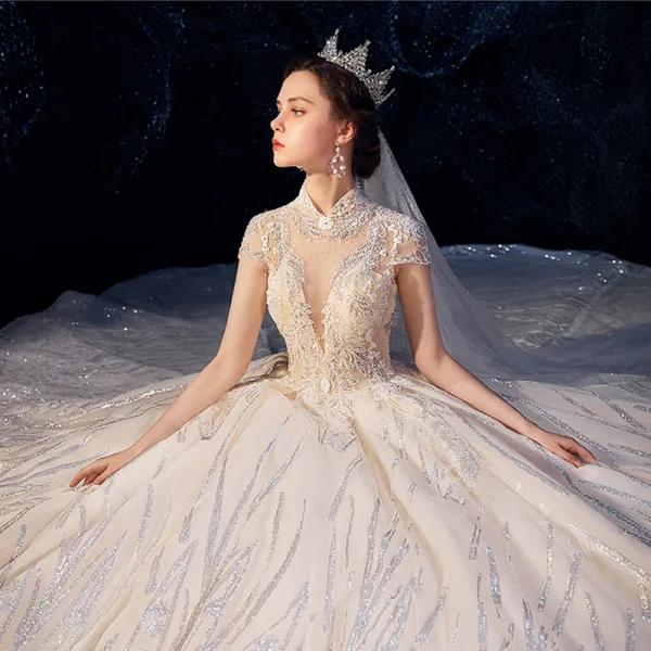 Sparkly Champagne See-through Wedding Dresses 2019 Ball Gown High Neck Cap Sleeves Backless Glitter Sequins Tulle Beading Royal Train Ruffle