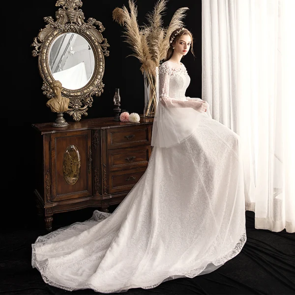 Eleganckie Kość Słoniowa Przezroczyste Ogród / Outdoor Suknie Ślubne 2019 Princessa Wycięciem Rękawy z dzwoneczkami Cekinami Tiulowe Aplikacje Kwiat Frezowanie Trenem Sąd Wzburzyć