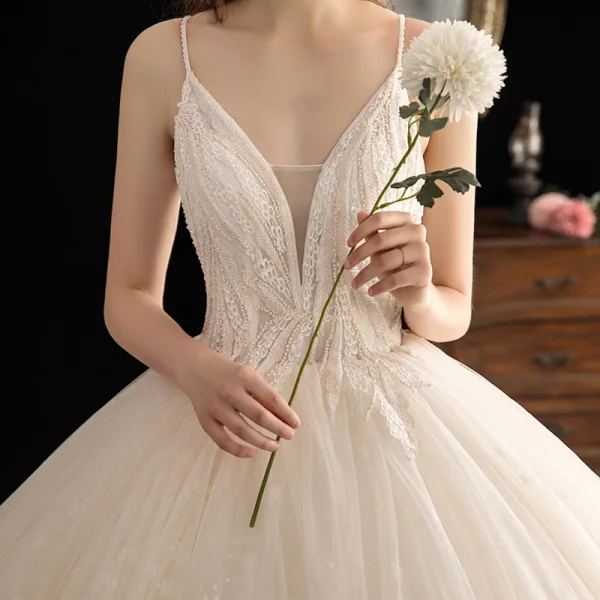 Luxury / Gorgeous Champagne Wedding Dresses 2019 Ball Gown Deep V-Neck Spaghetti Straps Sleeveless Backless Beading Glitter Appliques Lace Cathedral Train Ruffle