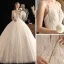 Luxury / Gorgeous Champagne Wedding Dresses 2019 Ball Gown Deep V-Neck Spaghetti Straps Sleeveless Backless Beading Glitter Appliques Lace Cathedral Train Ruffle