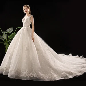 Chic Beautiful Champagne Wedding Dresses 2019 A Line Princess Deep V Neck Sleeveless Backless Glitter Sequins Tulle Appliques Lace Beading Chapel Train Ruffle