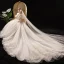 Schöne Champagner Brautkleider / Hochzeitskleider 2019 A Linie Off Shoulder Geschwollenes Kurze Ärmel Rückenfreies Applikationen Spitze Pailletten Perlenstickerei Kathedrale Schleppe Rüschen