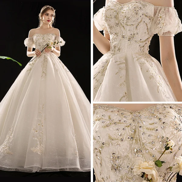 Schöne Champagner Brautkleider / Hochzeitskleider 2019 A Linie Off Shoulder Geschwollenes Kurze Ärmel Rückenfreies Applikationen Spitze Pailletten Perlenstickerei Kathedrale Schleppe Rüschen
