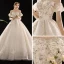 Schöne Champagner Brautkleider / Hochzeitskleider 2019 A Linie Off Shoulder Geschwollenes Kurze Ärmel Rückenfreies Applikationen Spitze Pailletten Perlenstickerei Kathedrale Schleppe Rüschen