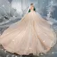 Luxe Champagne Transparentes Robe De Mariée 2019 Robe Boule Encolure Dégagée 3/4 Manches Dos Nu Paillettes Perlage Glitter Tulle Royal Train Volants