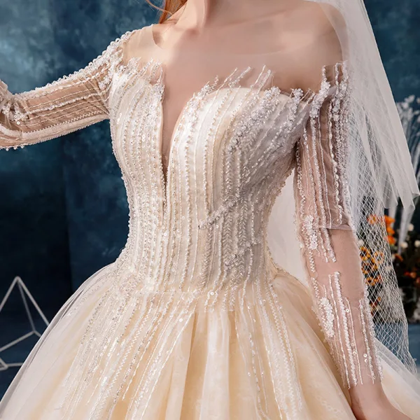 Elegante Doorzichtige Champagne Trouwjurken 2019 Baljurk Vierkante Halslijn Lange Mouwen Ruglooze Appliques Kant Kralen Cathedral Train Ruche