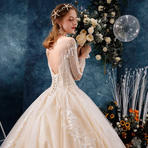 Elegante Doorzichtige Champagne Trouwjurken 2019 Baljurk Vierkante Halslijn Lange Mouwen Ruglooze Appliques Kant Kralen Cathedral Train Ruche