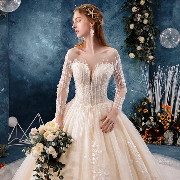 Elegante Doorzichtige Champagne Trouwjurken 2019 Baljurk Vierkante Halslijn Lange Mouwen Ruglooze Appliques Kant Kralen Cathedral Train Ruche