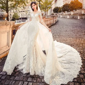 Charmant Transparentes Champagne Robe De Mariée 2019 Princesse Encolure Dégagée 1 2 Manches Dos Nu Appliques En Dentelle Chapel Train Volants