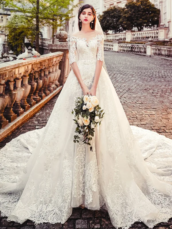 Charmant Transparentes Champagne Robe De Mariée 2019 Princesse Encolure Dégagée 1/2 Manches Dos Nu Appliques En Dentelle Chapel Train Volants