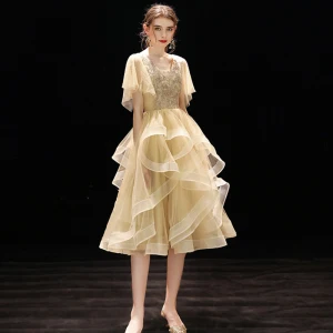 Chic Belle Champagne De Retour Robe De Graduation 2019 Princesse V Cou Manches Courtes Perlage Thé Longueur Volants En Cascade Dos Nu Robe De Ceremonie