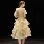 Chic / Belle Champagne de retour Robe De Graduation 2019 Princesse V-Cou Manches Courtes Perlage Thé Longueur Volants en Cascade Dos Nu Robe De Ceremonie