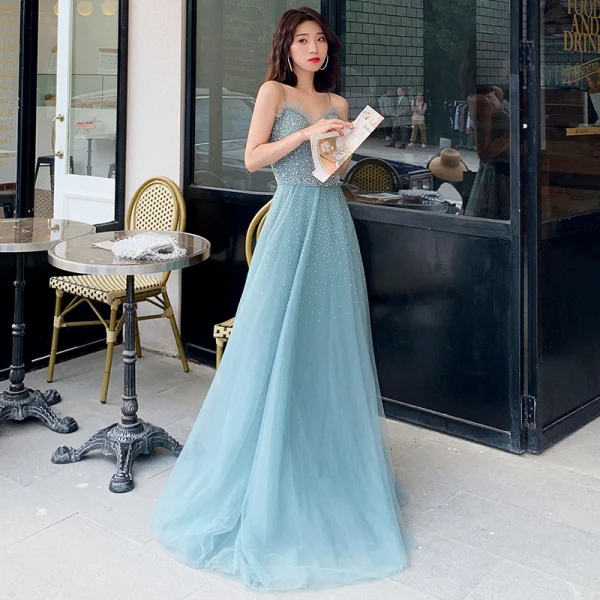 Élégant Océan Bleu Robe De Soirée 2019 Princesse Bretelles Spaghetti Sans Manches Perlage Longue Volants Dos Nu Robe De Ceremonie
