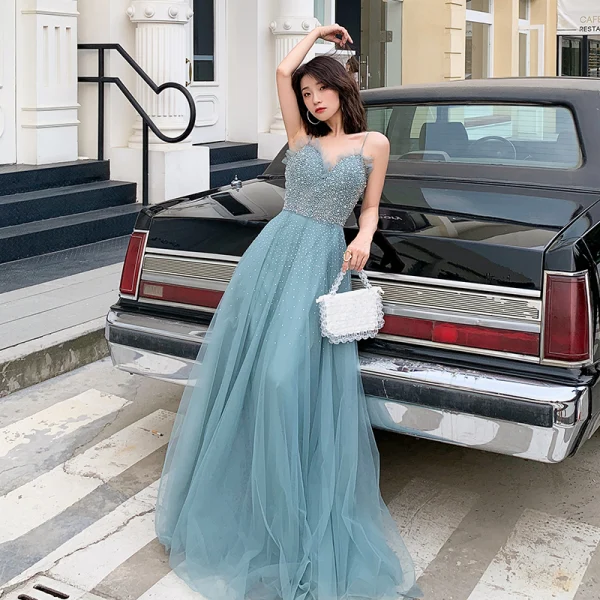 Élégant Océan Bleu Robe De Soirée 2019 Princesse Bretelles Spaghetti Sans Manches Perlage Longue Volants Dos Nu Robe De Ceremonie