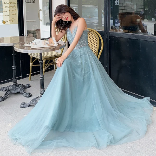 Élégant Océan Bleu Robe De Soirée 2019 Princesse Bretelles Spaghetti Sans Manches Perlage Longue Volants Dos Nu Robe De Ceremonie