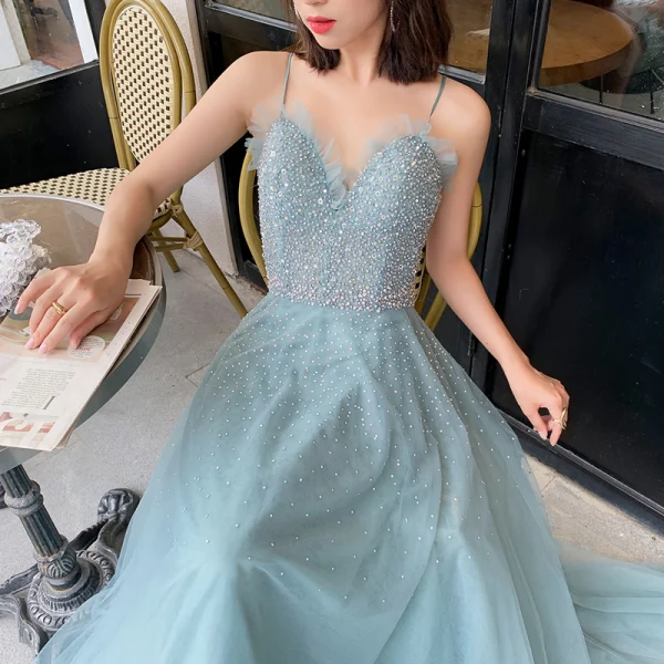 Élégant Océan Bleu Robe De Soirée 2019 Princesse Bretelles Spaghetti Sans Manches Perlage Longue Volants Dos Nu Robe De Ceremonie