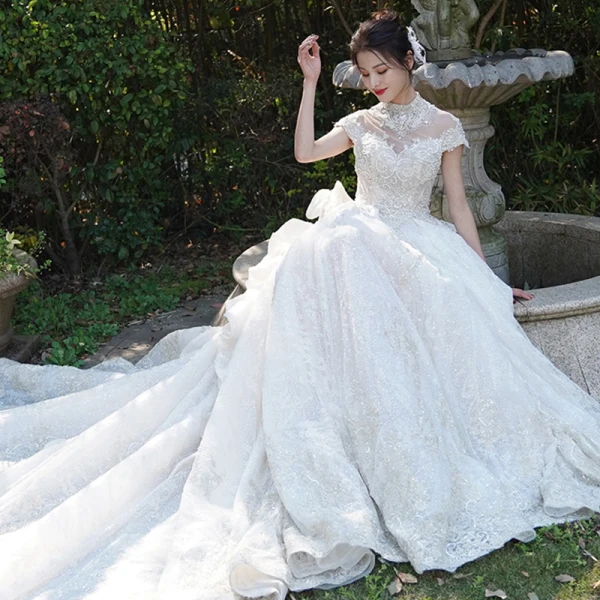 Vintage / Retro Luxury / Gorgeous See-through Champagne Wedding Dresses 2019 A-Line / Princess High Neck Short Sleeve Beading Appliques Lace Glitter Tulle Cathedral Train Ruffle