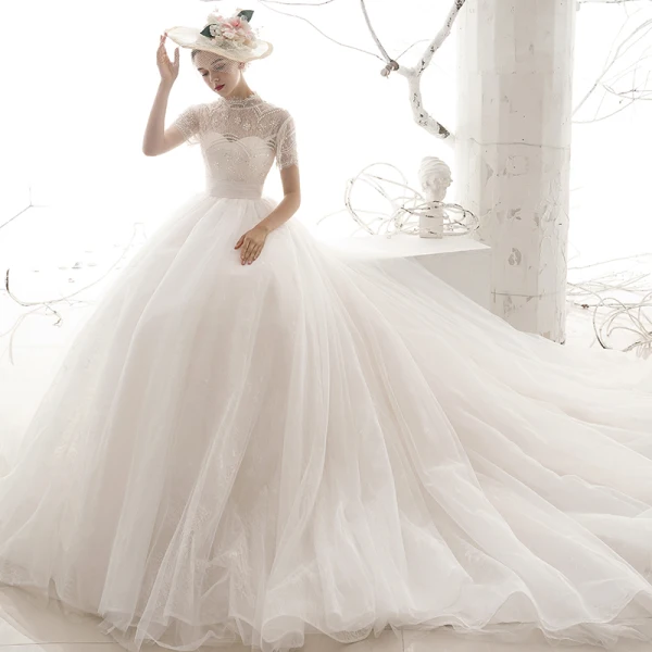Vintage Ivory / Creme Durchsichtige Brautkleider / Hochzeitskleider 2019 A Linie Stehkragen Kurze Ärmel Rückenfreies Pailletten Perlenstickerei Kapelle-Schleppe Rüschen