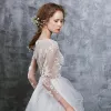 Illusion Ivory Summer See-through Wedding Dresses 2018 A-Line / Princess Scoop Neck Long Sleeve Appliques Lace Ruffle Cathedral Train