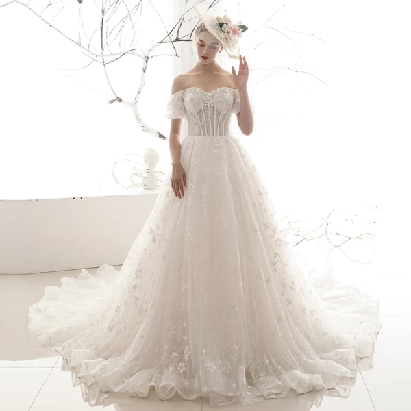 Chic / Belle Ivoire Robe De Mariée 2019 Princesse De l'épaule Gonflée Manches Courtes Dos Nu Appliques En Dentelle Perlage Chapel Train Volants Tulle