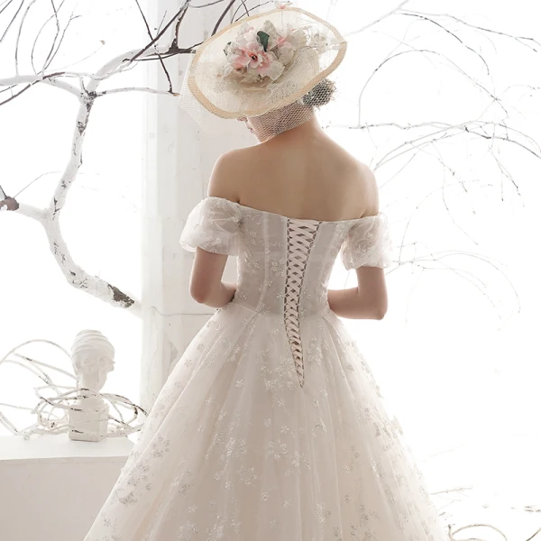 Chic / Belle Ivoire Robe De Mariée 2019 Princesse De l'épaule Gonflée Manches Courtes Dos Nu Appliques En Dentelle Perlage Chapel Train Volants Tulle