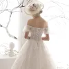 Chic / Beautiful Ivory Wedding Dresses 2019 A-Line / Princess Off-The-Shoulder Puffy Short Sleeve Backless Appliques Lace Beading Chapel Train Ruffle Tulle