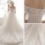 Chic / Belle Ivoire Robe De Mariée 2019 Princesse De l'épaule Gonflée Manches Courtes Dos Nu Appliques En Dentelle Perlage Chapel Train Volants Tulle