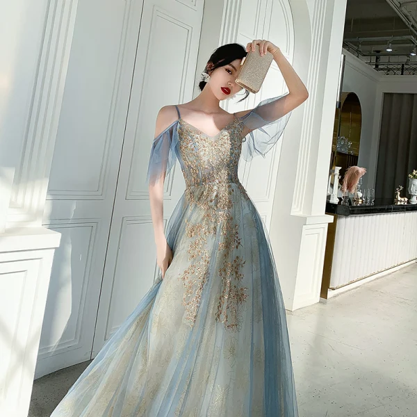 Chic / Belle Bleu Doré Robe De Soirée 2019 Princesse Bretelles Spaghetti Manches Courtes Paillettes Longue Volants Dos Nu Robe De Ceremonie