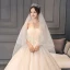 Chic / Belle Champagne Dentelle Robe De Mariée 2019 Robe Boule Bustier Sans Manches Dos Nu Glitter Tulle Appliques En Dentelle Perlage Chapel Train Volants
