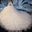 Chic / Belle Champagne Robe De Mariée 2019 Robe Boule Bretelles Spaghetti Sans Manches Dos Nu Glitter Appliques En Dentelle Perlage Cathedral Train Volants