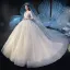Charming Champagne See-through Wedding Dresses 2019 Ball Gown Scoop Neck 3/4 Sleeve Glitter Tulle Beading Appliques Lace Cathedral Train Ruffle