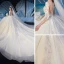 Charming Champagne See-through Wedding Dresses 2019 Ball Gown Scoop Neck 3/4 Sleeve Glitter Tulle Beading Appliques Lace Cathedral Train Ruffle
