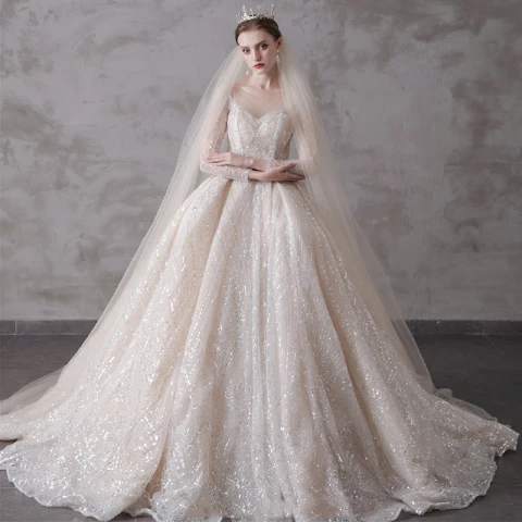 Glitter Champagne Doorzichtige Trouwjurken 2019 Baljurk Ronde Hals 3/4 Mouwen Ruglooze Pailletten Kralen Cathedral Train Ruche