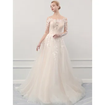 Illusion Champagne Transparentes Jardin Extérieur Robe De Mariée 2019 Princesse Encolure Dégagée Manches Longues Percé Appliques En Dentelle Tribunal Train Volants