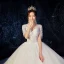 Romantic Champagne Wedding Dresses 2019 Ball Gown Deep V-Neck Short Sleeve Backless Pierced Appliques Lace Beading Cathedral Train Ruffle