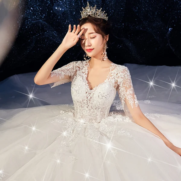 Romantic Champagne Wedding Dresses 2019 Ball Gown Deep V-Neck Short Sleeve Backless Pierced Appliques Lace Beading Cathedral Train Ruffle