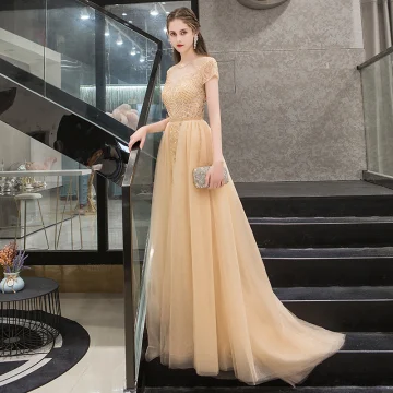 Illusion Doré Transparentes Robe De Soirée 2019 Princesse Encolure Dégagée Manches Courtes Faux Diamant Perlage Train De Balayage Volants Robe De Ceremonie