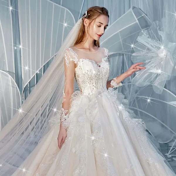 Charmant Champagne Transparentes Dos Nu Robe De Mariée 2019 Robe Boule Encolure Dégagée Manches Longues Glitter Tulle Appliques En Dentelle Perlage Cathedral Train Volants
