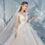 Charmant Champagne Transparentes Dos Nu Robe De Mariée 2019 Robe Boule Encolure Dégagée Manches Longues Glitter Tulle Appliques En Dentelle Perlage Cathedral Train Volants