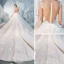 Charmant Champagne Transparentes Dos Nu Robe De Mariée 2019 Robe Boule Encolure Dégagée Manches Longues Glitter Tulle Appliques En Dentelle Perlage Cathedral Train Volants