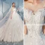 Charmant Champagne Transparentes Dos Nu Robe De Mariée 2019 Robe Boule Encolure Dégagée Manches Longues Glitter Tulle Appliques En Dentelle Perlage Cathedral Train Volants