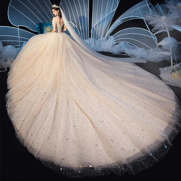 Schöne Champagner Brautkleider / Hochzeitskleider 2019 Ballkleid Off Shoulder Kurze Ärmel Rückenfreies Perlenstickerei Glanz Pailletten Kathedrale Schleppe Rüschen